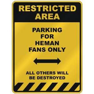  RESTRICTED AREA  PARKING FOR HEMAN FANS ONLY  PARKING 