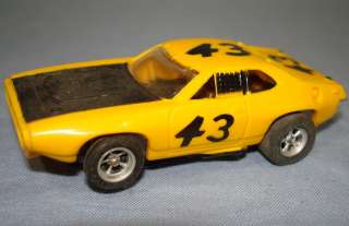 Aurora AFX Slot Car Racing Yellow Petty #43 Road Runner Chassis Mounts