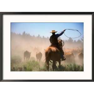 com Cowboy Working the Herd on a Cattle Drive through Central Oregon 