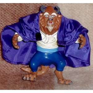   Beast comes with silk looking cape 5 tall X 5 wide Toys & Games