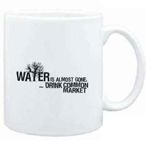  Mug White  Water is almost gone  drink Common Market 