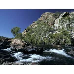  End Waterfall Flows Through Bell Gorge Past Pandani Palms, Australia 