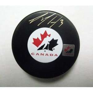 Dion Phaneuf Signed Puck CHA Team Canada Logo   Autographed NHL Pucks
