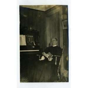   Woman in Rocking Chair by Piano Real Photo Postcard 