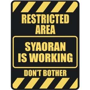   RESTRICTED AREA SYAORAN IS WORKING  PARKING SIGN