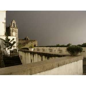  Rain and Sun Play on Castle Walls in Lisbon Stretched 