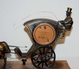  Horse & Carriage Clock   No. 701  Drivers Arm Moves and Cracks Whip 