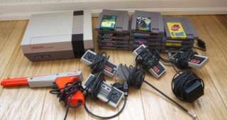 ORIGINAL NINTENDO NES GAME SYSTEM WITH 17 GAMES AND GUN WORKS 