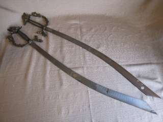 Pair of Dragon Pommel Swords w/Knightsheads on the Blades  