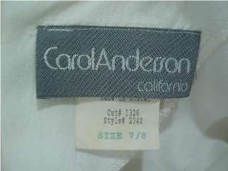 THIS IVORY COLORED DRESS BY CAROL ANDERSON IS VERY CUTE WHEN WORN.