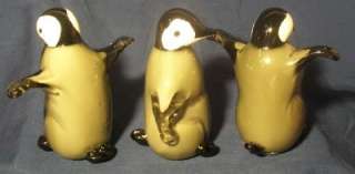   baby penguin figurines. Each is about 4.5 inches tall. New in box