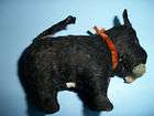 Black Fabric Covered Wind Up Toy Dog Including Its Original Key