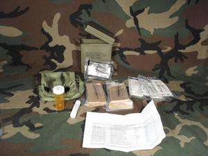 NEW MILITARY PARTIAL COMPLETE INDIVIDUAL FIRST AID KIT  