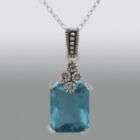 sterling silver marcasite and blue topaz cubic zirconia pendant