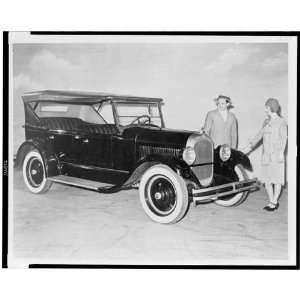  Man and woman in period costumes looking 1924 Chrysler 