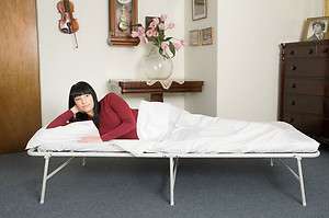 SUPER COMFORTABLE FOLDING GUEST BED   stores under bed  
