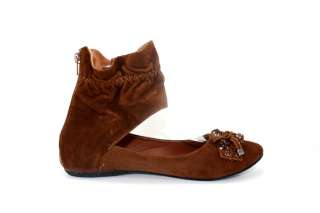   flat camel suede flat with studded fringe topped with a bow at the toe