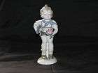 Wagner and Apel Boy With Gift & Flower Figurine German EUC 8 1/2