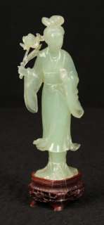 The jade figure measures about 7high (without stand), 3 wide and 2 