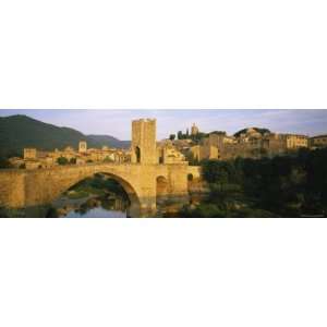 Arch Bridge Across a River in Front of a City, Besalu, Catalonia 