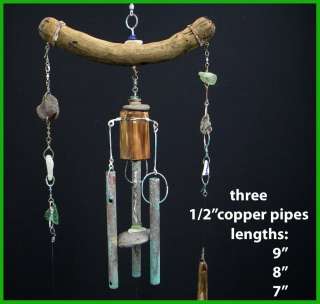   to a natural garden wind chime of sea glass and driftwood  