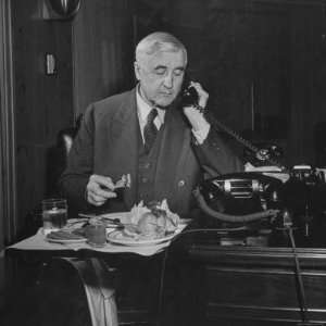  Jesse H. Jones Eating Lunch in His Office and Talking on 