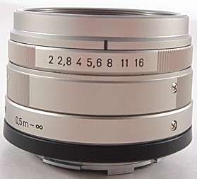   45mmf2 T* lens   with front and rear lens caps   serial # 7783394
