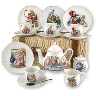 four 6 plates four 4oz tea cups/saucers 5 tall tea pot sugar 