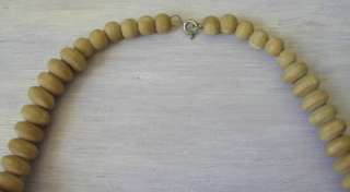 vintage wood bead necklace  round and geometric faceted beads madde 