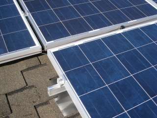 Solar panel mounting system for shingle roof, for 2 full size panel up 