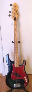 Black Peavey Fury 4 String Bass with a lead pickup added  
