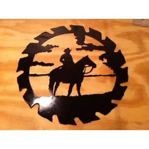   15 Inch Sawblade Featuring Cowboy on Horse Metal Art 